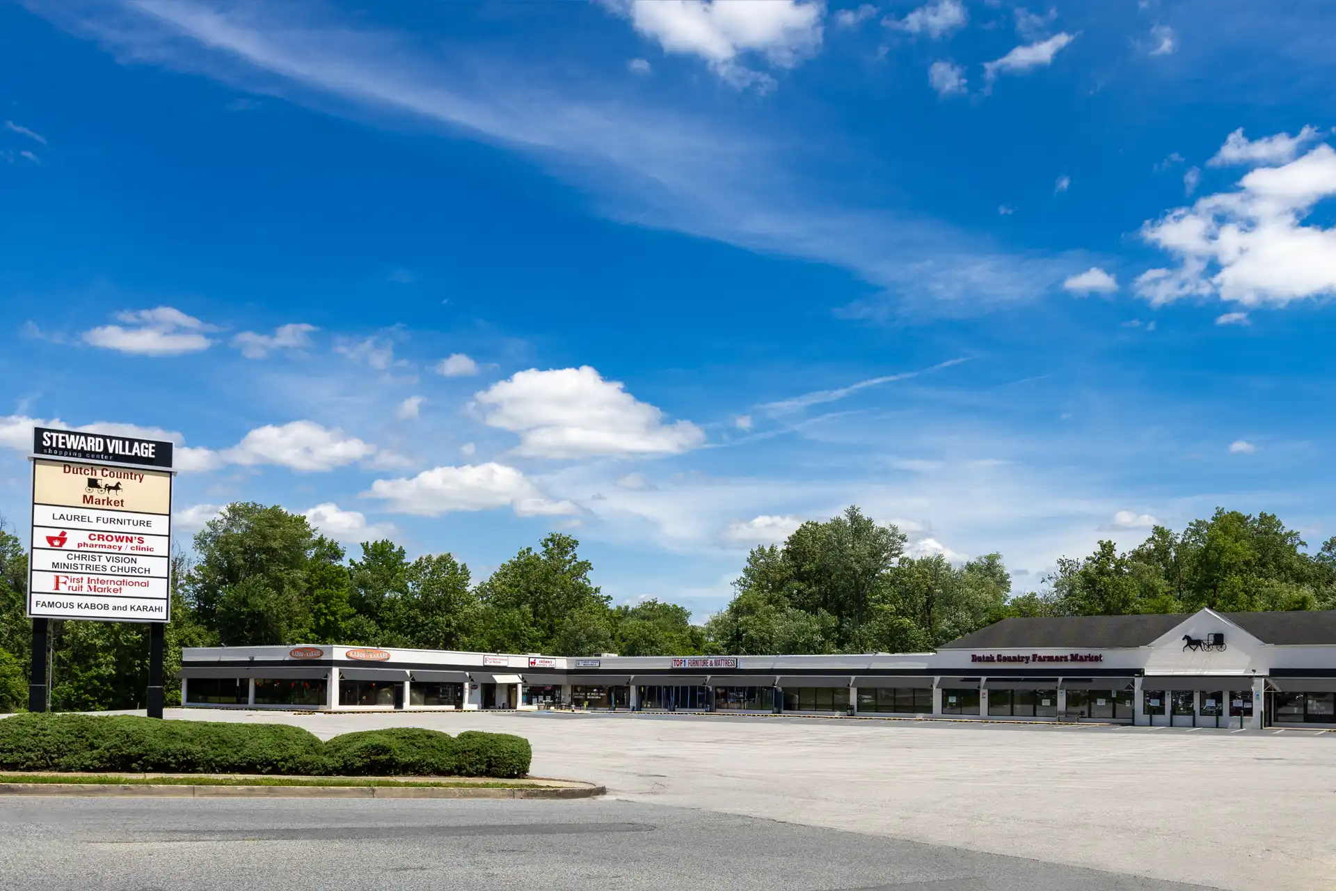 A street view of Steward Village Shopping Center, a high traffic space for rent in shopping center​ Laurel MD.